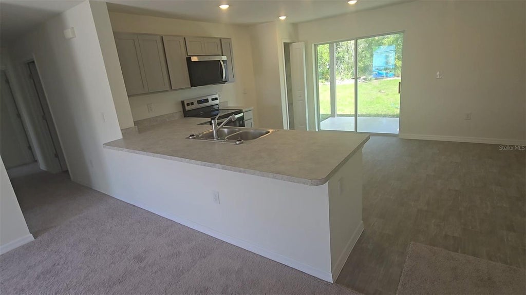 Photo of 100 Willow Drive, Poinciana, FL 34759 (MLS # C7530217)