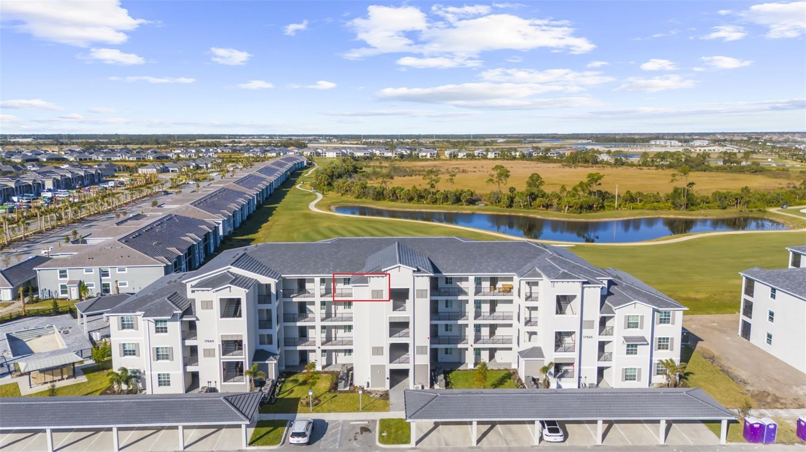 ANNUAL RENTAL AVAILABLE IN WELLEN PARK GOLF & COUNTRY CLUB! This 2024 2 bedroom/2 bath condo comes with AMENITIES and Optional GOLF MEMBERSHIP transfer. This condo has an unobstructed view of hole no. 5. Enjoy watching golfers hit their first shot from your screened lanai. The unit features quartz countertops, stainless steel appliances, impact windows, and an external storage unit just across from the elevator. The reserved covered parking space is conveniently located on the front row near the elevator. There is a satellite pool located next to the unit. The 18-hole Wellen Park Golf and Country Club has a guard-gated entrance and luxury amenities including a resort-style pool with tiki bar, 3 additional satellite pools, a day spa, pickleball courts, tennis courts and bocce ball. With the exception of the future Clubhouse, all amenities are currently completed and available to enjoy. Wellen Park is close to gulf beaches, local attractions and a short distance to Downtown Sarasota and Venice. Downtown Wellen Park has an array of shops, weekly music venues, dining options, a large lake with walking trails and E-bike, Kayak and Paddle board rentals, weekly farmer's market and more. Water and basic cable/internet are included.
