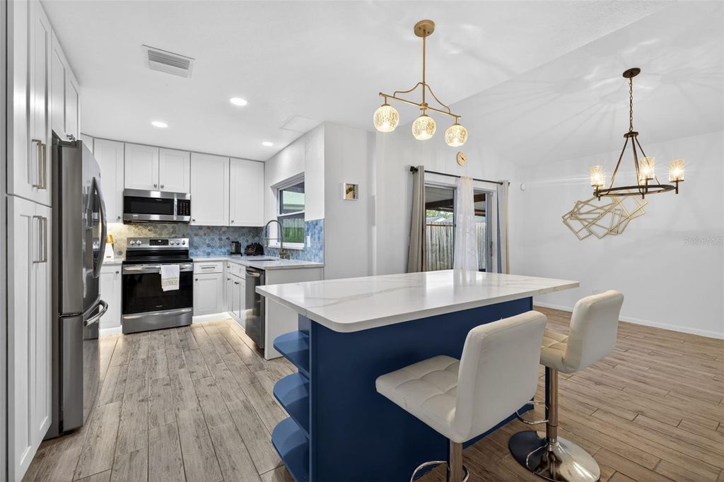 Photo of 2705 Lakeville Drive, Tampa, FL 33618 (MLS # TB8503932)