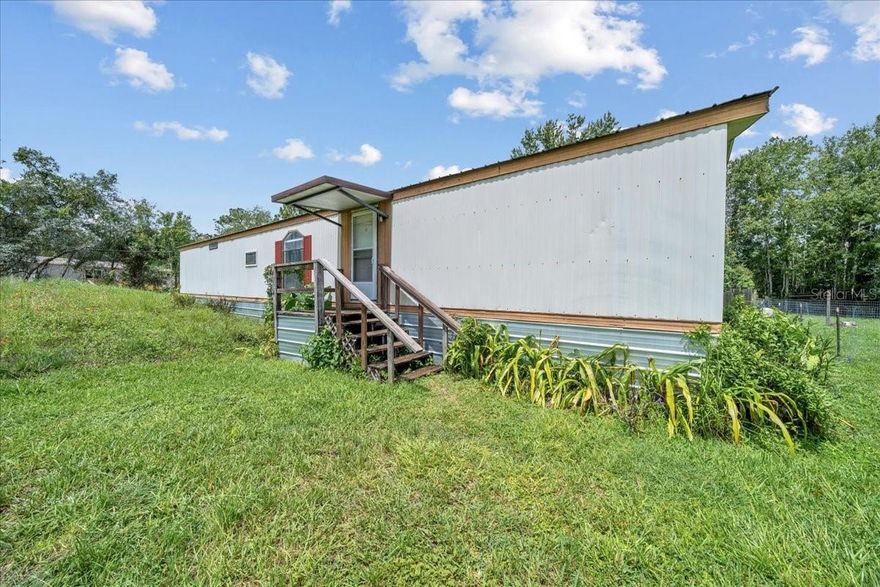 One or more photo(s) has been virtually staged. MOTIVATED SELLER! Cozy & Updated 2-Bedroom, 2-Bath Home in Homosassa! Step inside this inviting mobile home and discover a warm, updated interior featuring beautiful vinyl flooring throughout. The kitchen offers rich wood cabinets, stainless steel appliances, and plenty of counter space for cooking and entertaining. Enjoy the convenience of indoor laundry, making daily tasks a breeze. The primary suite boasts an updated bathroom with a stylish vanity and a modern walk-in shower. With two full bathrooms, comfortable living spaces, and a great location near Homosassa’s waterfront, dining, and shopping, this home is great for year-round living or a relaxing getaway!