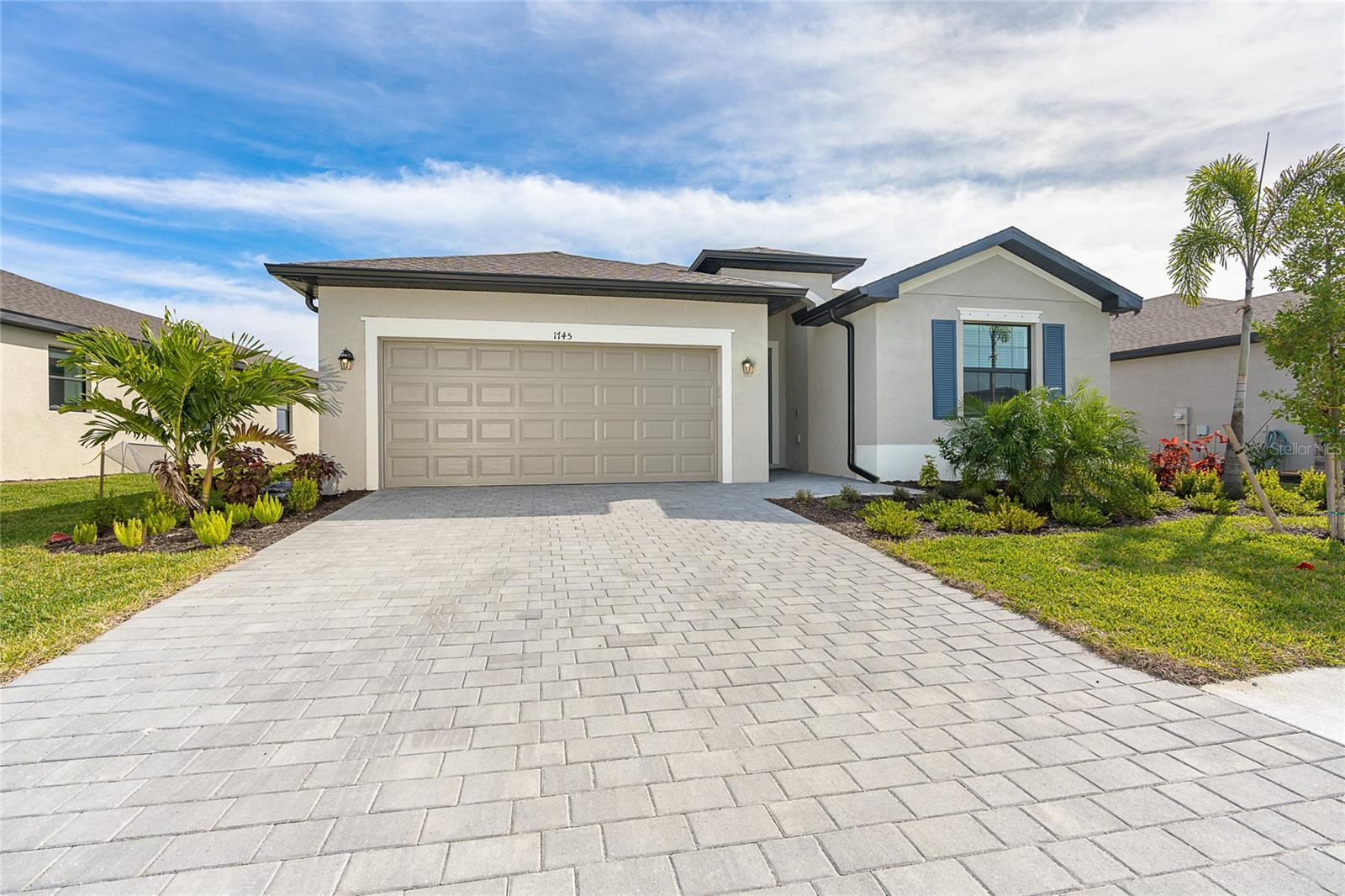 Enjoy the epitome of comfort and style in this immaculate Lennar built Trevi model, an annual rental opportunity that comes unfurnished and ready for you to infuse it with your personal touch. Featuring 4 generous bedrooms, 3 pristine bathrooms, and a sprawling 2032 square feet of living space, this detached home offers an array of features designed for upscale living. Upon entering, you will be greeted by high ceilings that add to the spacious feel. The split floor plan ensures privacy while the high-quality tile and granite countertops throughout the kitchen and baths add a touch of elegance. Take relaxation to the next level in the owner’s suite, which is a serene retreat boasting two large walk-in closets, en-suite bath complete with dual sinks, a luxurious shower and a deep soaking tub, and private lanai access presenting tranquil lake views. Entertain guests or spend quality family time in the expansive living and dining area. The bonus room/den offers flexibility – use it as an office, a TV room, or even a 3rd bedroom according to your needs. Located in Biscayne Landing in the heart of Port Charlotte, you are never too far from nature preserves, the beach, shopping, dining, or Port Charlotte Town Center/Mall. Residents also enjoy access to a community pool, a clubhouse, fitness center, and two pickleball courts, fostering a vibrant and active community lifestyle. Embrace the luxury of a maintenance-free lifestyle in this gated community, where every detail is meticulously managed for you. The monthly rental covers not only the common area maintenance, ensuring pristine surroundings year-round, but also extends to comprehensive lawn care, from precise edging and blowing to advanced turf fertilization and insect control. This attention to detail guarantees a lush, inviting outdoor space without any effort on your part. Furthermore, residents enjoy the convenience of bulk cable and high-speed internet included in the rent, enabling you to stay connected and entertained without the hassle of separate bills. This harmonious blend of comfort, care, and connectivity makes this hidden gem an experience of effortless elegance. Don't miss the chance to call this stunning property your new home. Contact us today for a viewing and experience luxury living in a dynamic community.