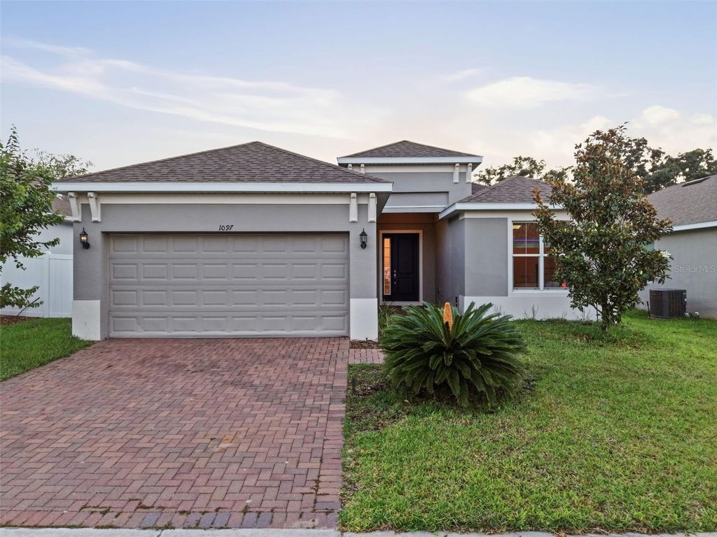 Photo of 1097 Hendon Loop, Davenport, FL 33837 (MLS # O6412366)