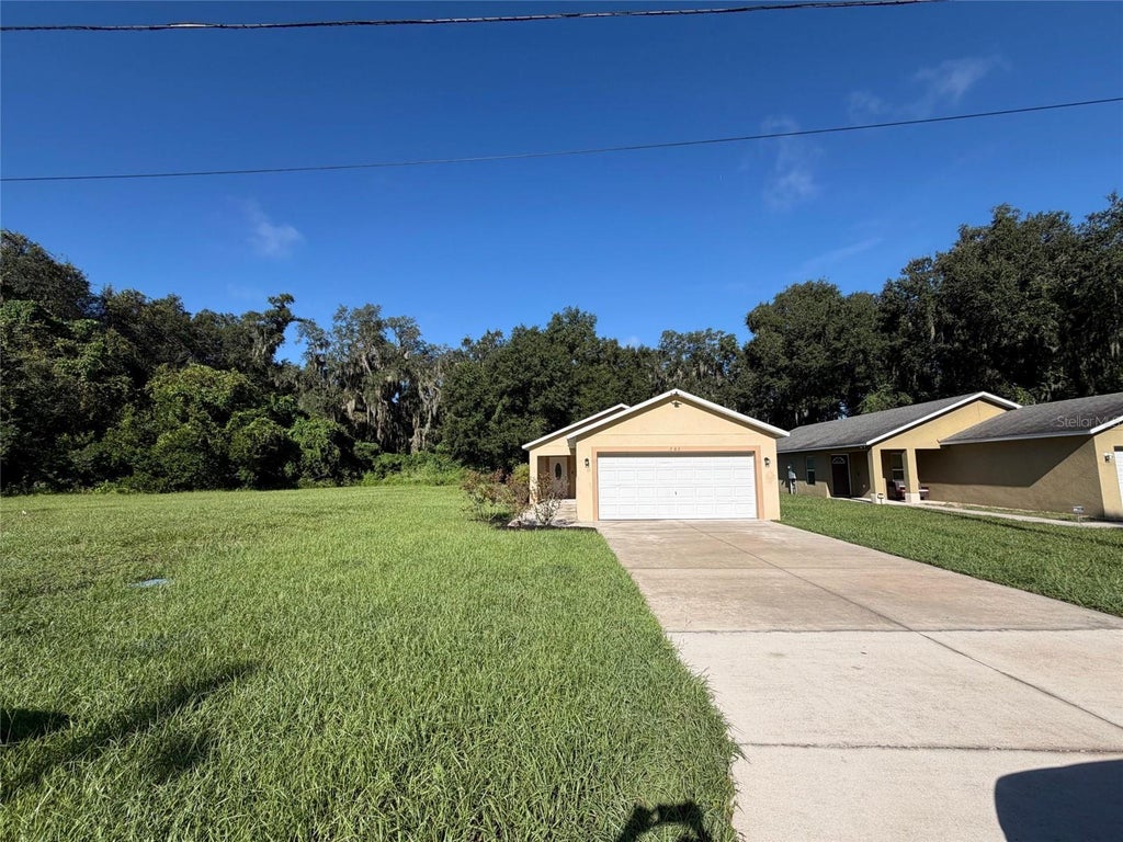 Photo of 705 5th Street, Wildwood, FL 34785 (MLS # O6439448)