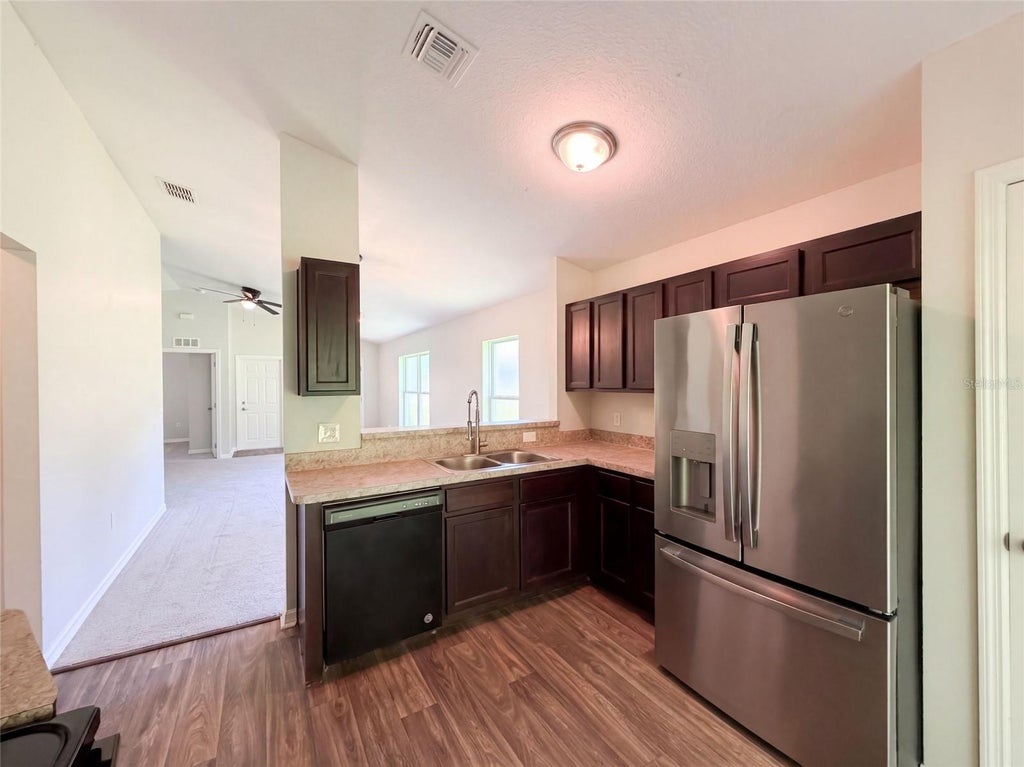 Photo of 705 5th Street, Wildwood, FL 34785 (MLS # O6439448)