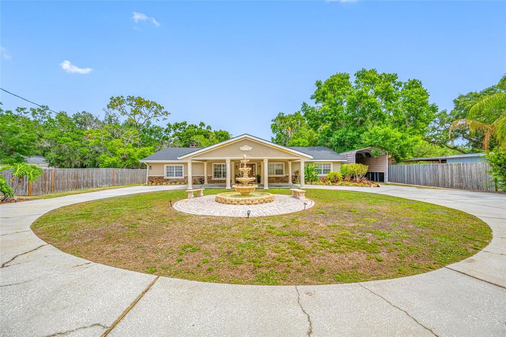 Photo of 15314 Lake Magdalene Boulevard, Tampa, FL 33618 (MLS # TB8505655)