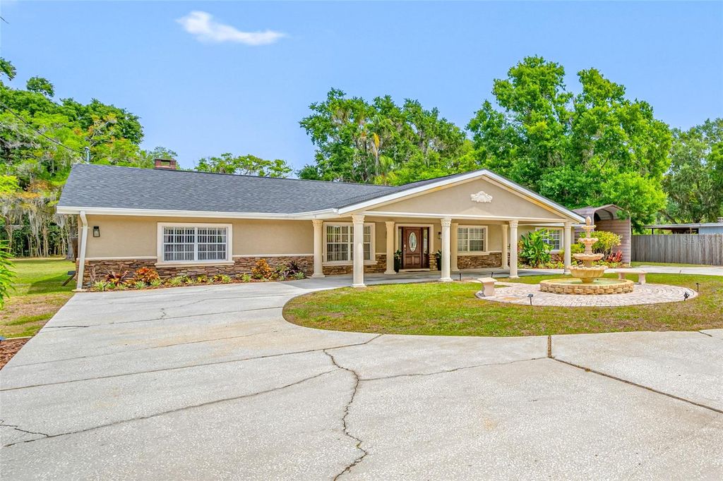 Photo of 15314 Lake Magdalene Boulevard, Tampa, FL 33618 (MLS # TB8505655)
