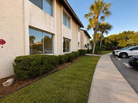Photo of 2702 Hidden Lake Drive S #A, Sarasota, FL 34237 (MLS # C7527047)