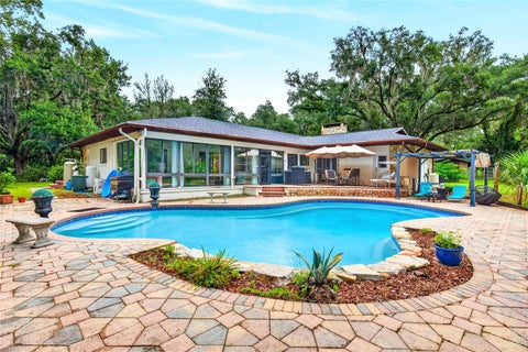 Photo of 11795 SW Highway 484, Dunnellon, FL 34432 (MLS # O6423543)