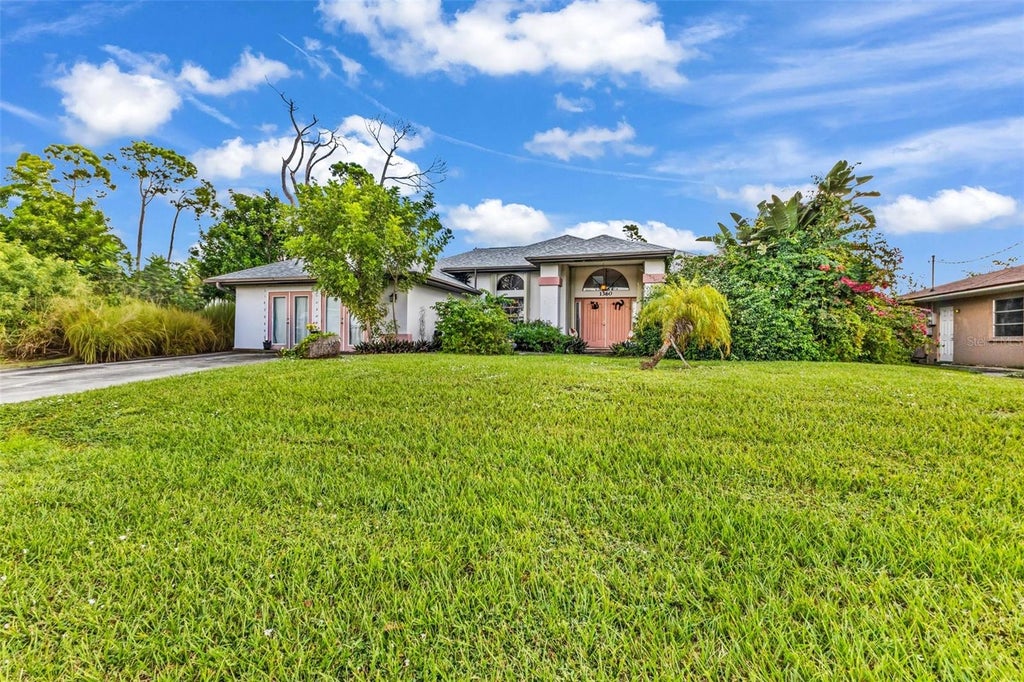 Photo of 1360 Inverness Street, Port Charlotte, FL 33952 (MLS # C7532300)