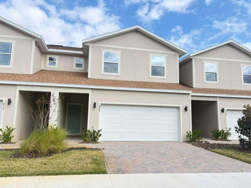 Welcome to your dream townhome in the picturesque city of Clermont, Florida! Nestled in the sought after community, Lakefront Village, this stunning property offers the perfect blend of comfort, convenience, and breathtaking lake views. This *3 BED / 2 FULL BATH / 1 HALF BATH TOWNHOME is located near the intersection of US Highway 27 and FL-50, with convenient access to Florida’s Turnpike and FL-429. Walk in through the front door and be amazed by this spacious and filled with natural light home, with remarkable views to Jack's Lake. The main level features sliding doors to the balcony, perfect for relaxing and enjoying the view. The KITCHEN features GRANITE COUNTERTOPS, 36" white UPPER CABINETRY, STAINLESS STEEL APPLIANCES such as MICROWAVE, DISHWASHER, RANGE, REFRIGERATOR and an ISLAND. Going upstairs, the MASTER SUITE features WALK-IN CLOSET, DUAL GRANITE VANITY and stand up shower with enclosure. BEDROOMS 2 and 3 share the second full bathroom and LAUNDRY is conveniently located on the second floor. The lower level consists in an oversized open space (not under AC). The open lower level gives access to the backyard, with views and walking distance to the lake. This home also offers a 2 CAR GARAGE with paved driveway. The community features sidewalks, views and access to Jack's Lake.