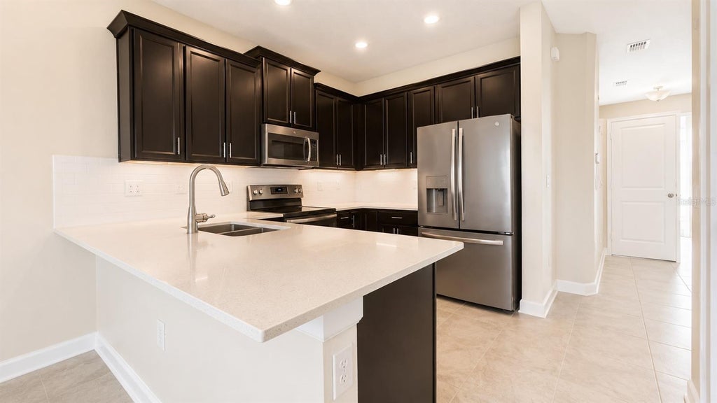 Photo of 4836 Tribute Trail, Kissimmee, FL 34746 (MLS # S5151541)