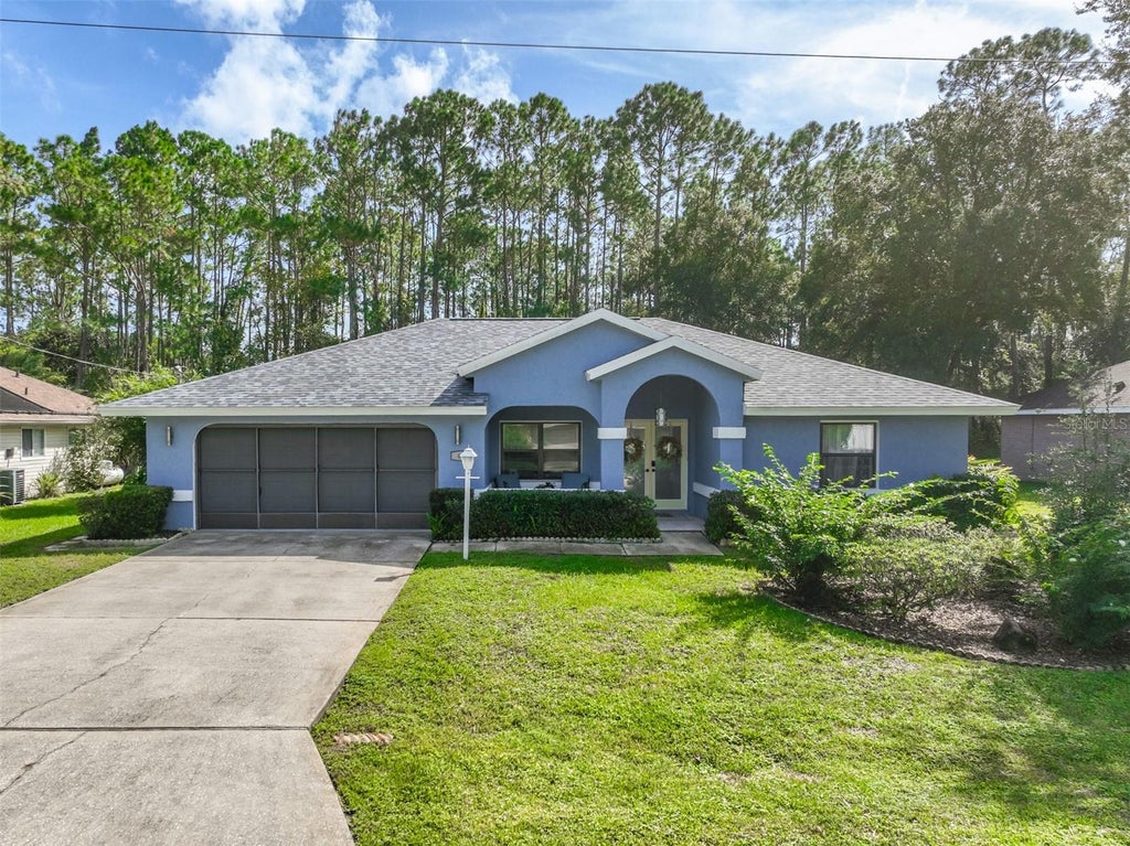 Photo of 49 Wellshire Lane, Palm Coast, FL 32164 (MLS # V4952025)