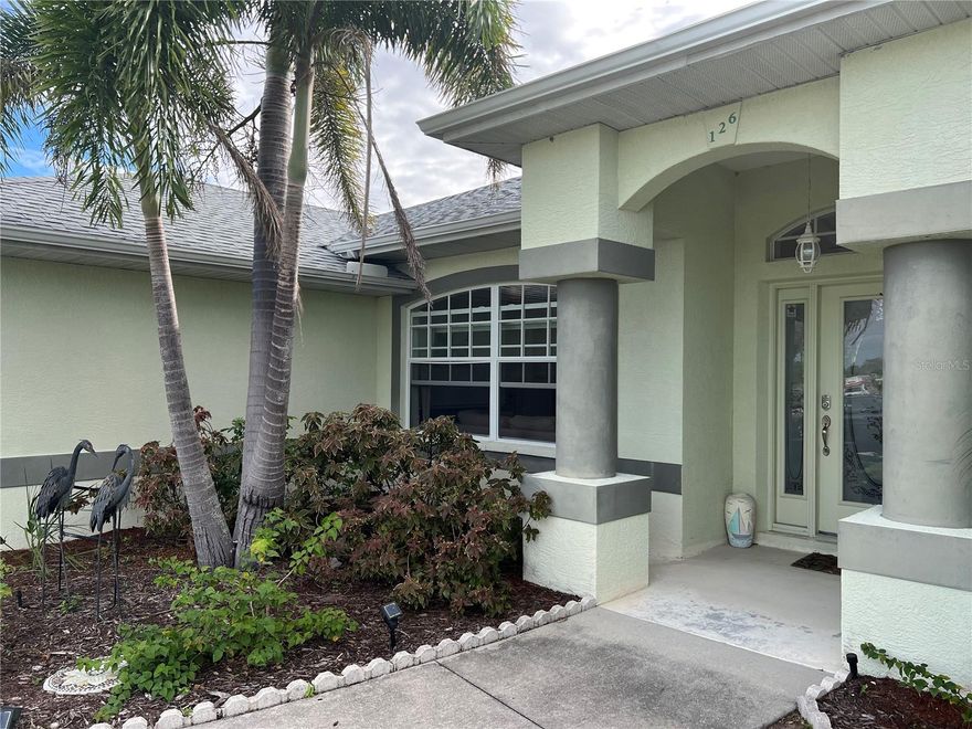 The vacation rental home in Rotonda Heights offers an open concept and split floor plan, making it an ideal space for relaxation and entertainment.  The layout provides a seamless flow between the main living areas, creating a spacious and inviting atmosphere.  With the bedrooms situated on the opposite sides of the home, guests can enjoy privacy and comfort during their stay.  An oversized second bedroom offers direct access to the pool area which provides guests with a private retreat within the home.  You can easily step out onto the pool deck and enjoy a refreshing swim or lounge by the pool.  

One of the standout features of the vacation rental home is the oversized garage equipped with screens.  This unique addition allows guests to enjoy the fresh air and scenic views while still being protected from insects and pests.  The screened garage ensures a comfortable and enjoyable experience for anyone utilizing the space.  The space also provides ample room for parking, storage or even setting up a workshop for those who seek creativity or need to pursue their hobbies during their stay.