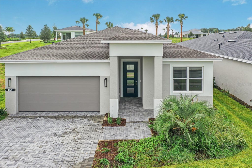 Photo of 1620 Bellagio Loop, Tavares, FL 32778 (MLS # W7887478)