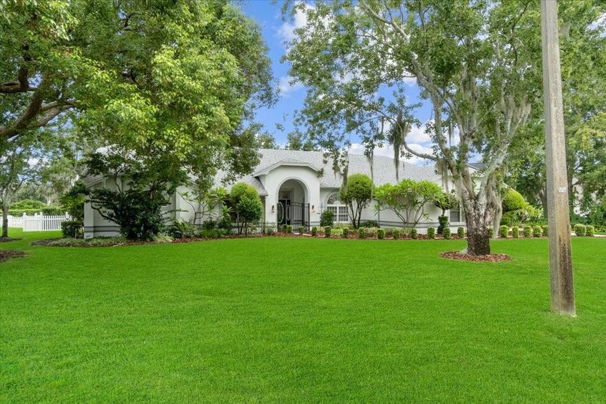 One or more photo(s) has been virtually staged. Located in the desirable Hamilton Pointe community, this beautifully maintained 4-bedroom, 2.5-bath, 3,114 sf pool
home built in 1992, sits on a half-acre lot with no rear neighbors offering peaceful views of a protected conservation
area and ultimate backyard privacy.  Features include a spacious kitchen with eat-in area and French doors to the lanai,
a grand family room with 13’ ceilings, crown molding, and a striking coral tile fireplace. The split floor plan offers a large
master suite with garden tub, walk-in shower, dual vanities, and lanai access, with one bedroom perfect for an office
space.  Two bedrooms are on the other side of the home with another full bath and laundry room. Enjoy mature
landscaping, a refreshing screened-in pool (resurfaced approx. 3 years ago, new sand filter 2 years ago, rescreened 1
year ago), and numerous updates—new roof (2019), Hybrid electric heat pump water heater that is in the garage
(2021), gutters/screens (2020), exterior paint (2019) and whole house was re-piped (2021) . Convenient to downtown
Winter Haven, Hwy 27, LEGOLAND, golf, shopping, and airports.  A Satisfactory 4-Point Inspection has been done.