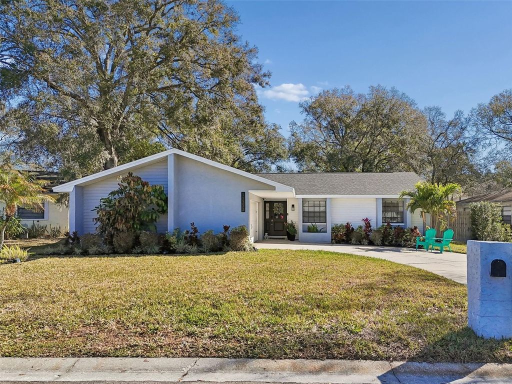 Photo of 11313 Carrollwood Estates Drive, Tampa, FL 33618 (MLS # TB8476545)