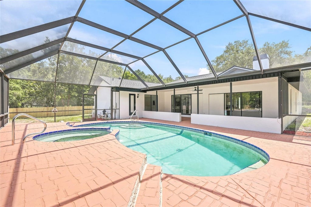 Photo of 18815 Gracie Lee Street, Spring Hill, FL 34610 (MLS # TB8521674)