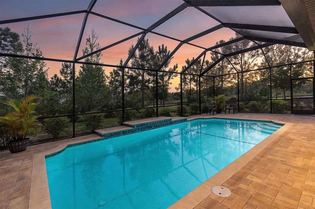 Photo of 3820 Woods Rider Loop, Odessa, FL 33556 (MLS # TB8491218)