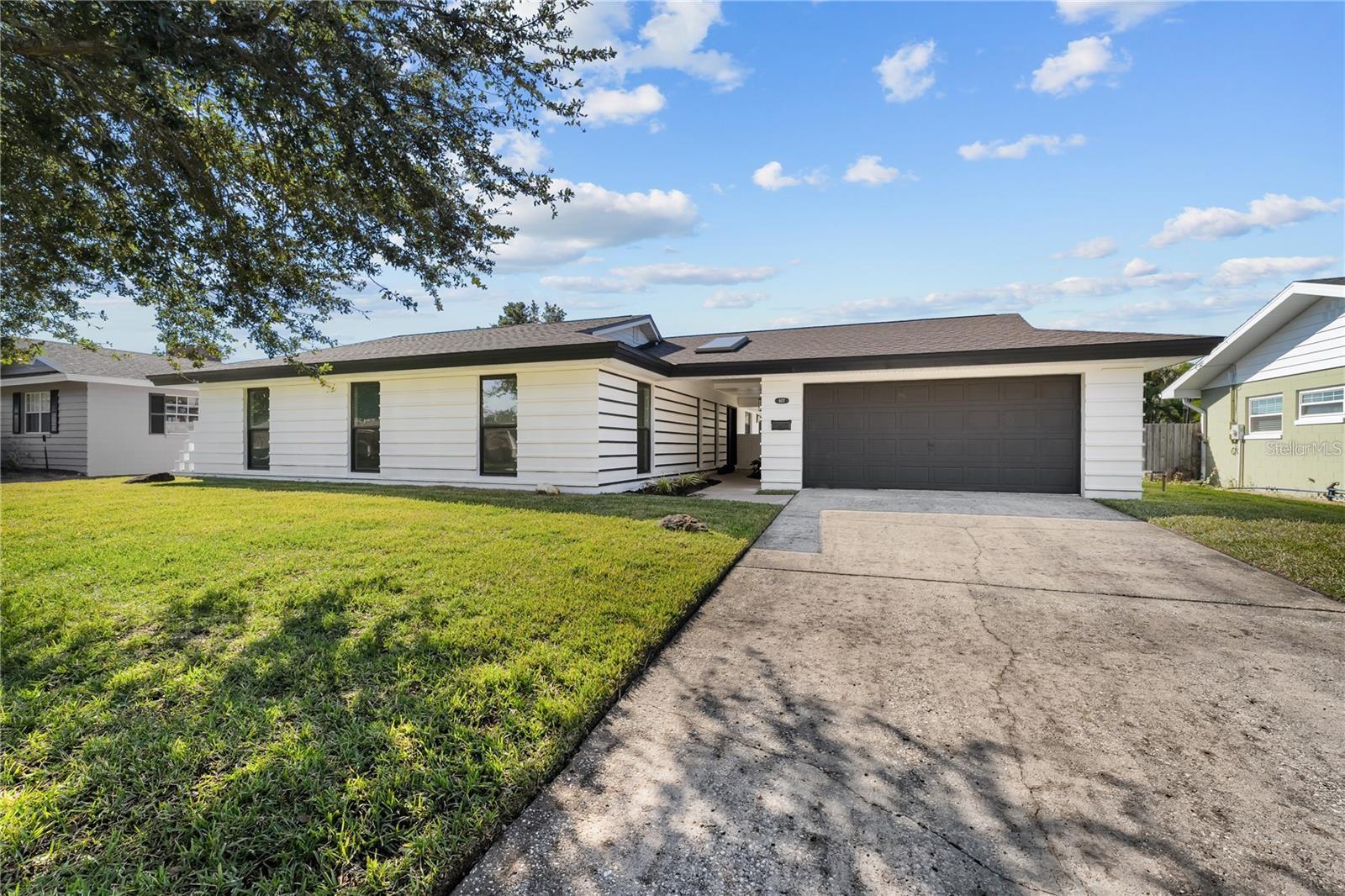 Welcome to this beautifully renovated 4-bedroom, 2.5-bath home in the heart of Winter Park, just minutes from Park Avenue’s top dining and shopping. Thoughtfully updated from top to bottom, this move-in-ready home features a brand-new AC system, luxury vinyl plank flooring throughout, and a stunning chef’s kitchen with quartz waterfall countertops, custom cabinetry, and all-new stainless steel appliances. Each bathroom has been modernized with sleek, contemporary finishes, while the spacious primary suite offers a private retreat with a beautifully updated ensuite. Outside, the fully fenced backyard provides a perfect space for relaxation or entertaining, and the two-car garage offers ample storage with easy access to the main living areas. Situated in a prime location with convenient access to I-4 and SR-417, this home blends modern elegance with unbeatable convenience. Don’t miss your chance to experience Winter Park living at its best—schedule your showing today!