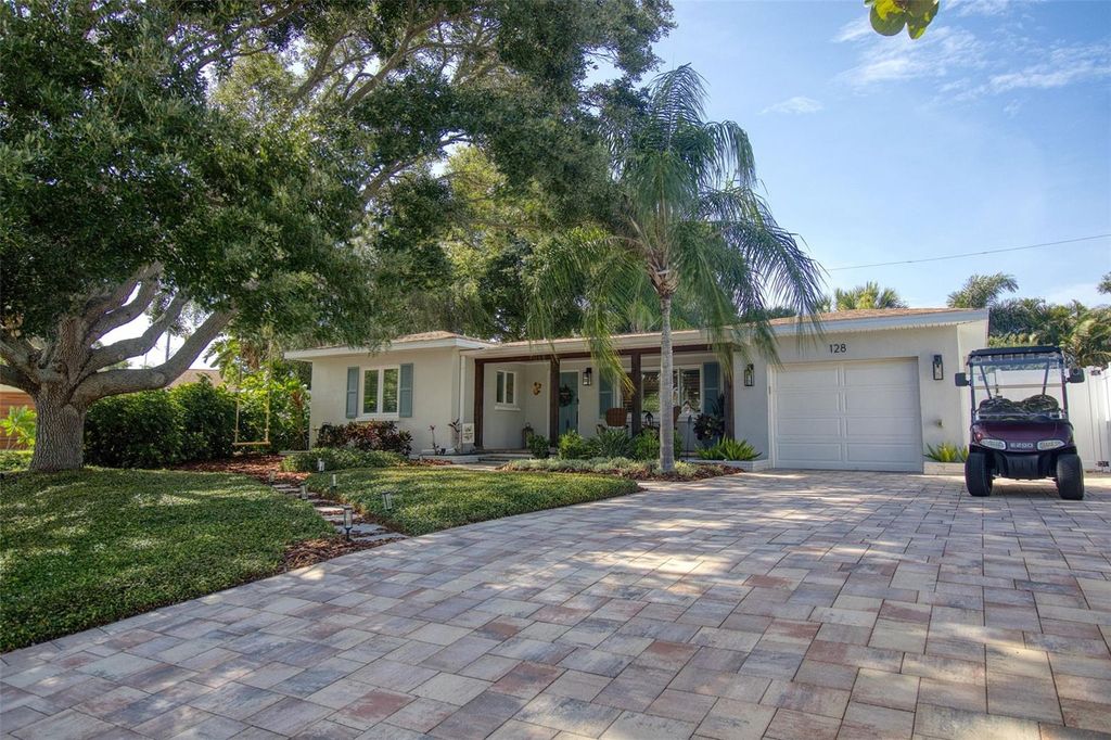 Photo of 128 Edgewater Terrace, Dunedin, FL 34698 (MLS # TB8512944)