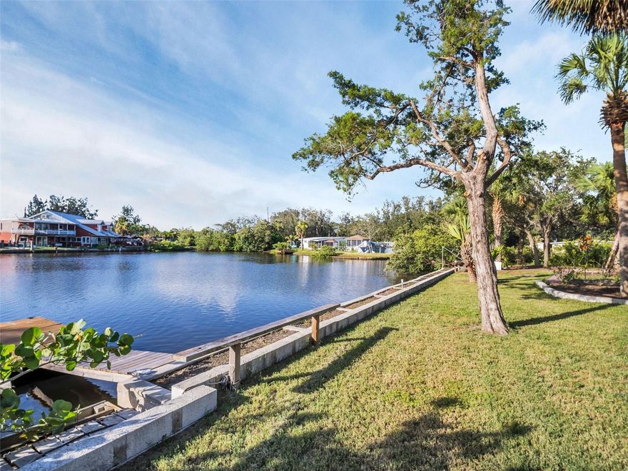 Also listed as residential MLS#TB8447875  WATERFRONT PARADISE! RARE OPPORTUNITY! GULF ACCESS! 2.3 PRIVATE ACRES! YOUR OWN BOAT RAMP! RV PARKING/HOOK UP! LARGE GARAGE AND LARGE DETACHED BUILDING! DEAD END STREET! NO HOA! There is an Elevated home WITH POOL on 2.3 PRIVATE ACRES WITH GULF ACCESS – Just 1.5 Miles from Downtown New Port Richey! Don’t miss this rare opportunity to own a stunning, waterfront retreat situated on 2.3 acres with 240 FEET OF DIRECT FRONTAGE on Cross Bayou, offering easy access to the Gulf of Mexico! This expansive, private estate setting delivers the ultimate Florida lifestyle—golf cart friendly and ready for entertaining, relaxing, and exploring the water.  The property is equipped with water, a dedicated drain, and a 220V outlet, making it RV-ready and perfect for convenient parking and hookup. The massive pole barn offers plenty of versatile space—perfect for storing extra vehicles, boats, recreational gear, or even setting up a workshop or greenhouse. The expansive lot still leaves ample room for future additions like a pickleball court, putting green, or anything else you envision. Close proximity to downtown New Port Richey,  Enjoy the perfect mix of privacy and convenience. Whether you're looking for a primary residence, vacation home, or smart investment, this property truly has it all. Schedule your private tour today—homes like this are rarely available!