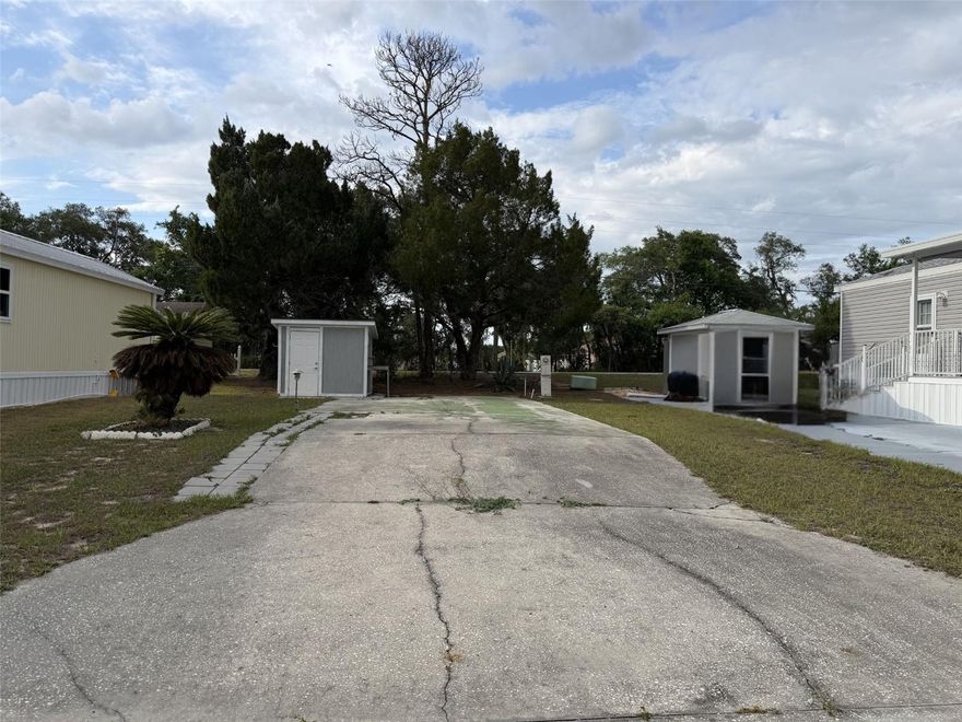 Fractional Ownership. This rare-to-market lot at 21 Fairview Dr N offers a premier location in the heart of Central Florida. You are a short drive away from the charm of Winter Haven, the shopping centers, restaurants, grocery stores, and the excitement of Legoland. Additionally, you are located between Tampa and Orlando for all your big city amenities, making this an unbeatable spot for a primary residence or a vacation getaway. Unlike many nearby communities, here you own the land outright! With low HOA dues at $210, due annually, you have the perfect location with low HOA costs.
