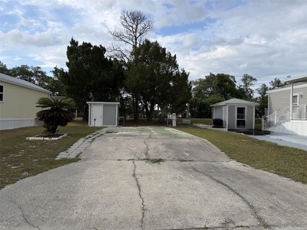 Photo of 21 Fairview Drive N, Haines City, FL 33844 (MLS # O6408170)