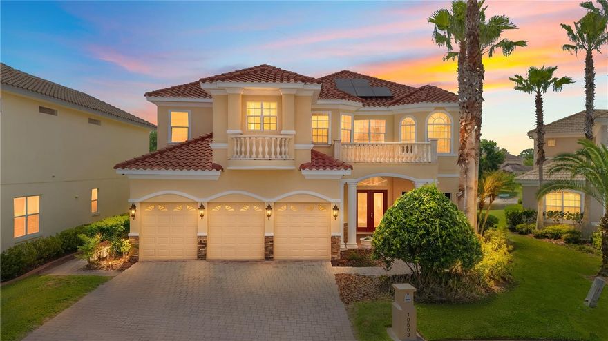 Nestled within the prestigious Cory Lake Isles community, this extraordinary lakefront residence offers an unparalleled blend of luxury, comfort, and resort-style living. Perfectly positioned on a quiet cul-de-sac and overlooking a breathtaking 165-acre ski-sized lake, this home captures the essence of refined waterfront living in one of Tampa’s most sought-after gated communities. From the moment you enter, you are greeted by soaring 22-foot tray ceilings and an impressive sense of scale and elegance. Thoughtfully designed with both sophistication and functionality in mind, the home features rich cherry walnut cabinetry, expansive living spaces, and timeless architectural details throughout. Step outside into your private tropical retreat where an infinity-edge pool finished with elegant gold travertine in a French pattern creates a true resort ambiance. Surrounded by grand royal palms, the outdoor living area is designed for both relaxation and entertaining, complete with a sun shelf, spa jacuzzi, and stunning panoramic water views. A private dock provides direct access to the lake for boating, fishing, and enjoying the Florida lifestyle year-round. Meticulously maintained since new and protected under a home warranty, this residence also offers significant recent upgrades including a new roof recently installed, three newer AC units, a two-year-old water heater, and a new pool pump, offering enhanced efficiency and long-term value. Beyond the home itself, Cory Lake Isles delivers an unmatched lifestyle experience. Residents enjoy 24-hour staffed gated security, beautifully paved streets, a resort-style Beach Club, community pool, tennis courts, basketball courts, volleyball, soccer fields, cricket pitch, playgrounds, and year-round community events that foster a vibrant and connected atmosphere. Combining luxury finishes, exceptional outdoor living, and the serenity of lakefront living, this remarkable property presents a rare opportunity to own a piece of one of Tampa’s most distinguished waterfront communities.