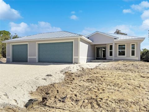 Photo of 9340 Canna Street, Port Charlotte, FL 33981 (MLS # C7514455)