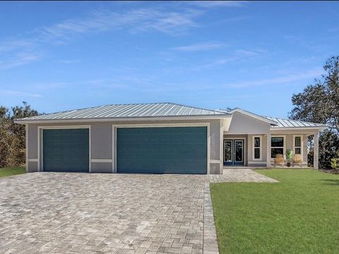 Photo of 9340 Canna Street, Port Charlotte, FL 33981 (MLS # C7514455)