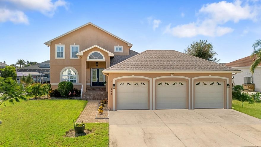 Freshly painted and move-in ready — fully furnished or Airbnb-ready! With No CDD or HOA!
Experience luxury waterfront living in this custom-built 4-bedroom, 3-bath, 3-car garage pool home on a canal. High ceilings, abundant natural light, and oversized double entry doors set the tone, opening to a great room with sweeping views of the pool and canal. The gourmet kitchen features 42” solid wood cabinetry, granite countertops, updated appliances, breakfast bar seating, and a beautiful backsplash—plus direct access to the lanai, pool, and boat dock. A formal dining room with a butler’s bar and built-in cabinetry is perfect for entertaining. The first floor features three spacious bedrooms, each equipped with luxury vinyl plank flooring and large custom closets. Two share a Jack-and-Jill bath, while the fourth enjoys an en suite bath that also serves the pool. Upstairs, the private owner’s retreat boasts a sitting area, private balcony overlooking the water, tray ceilings, and an updated spa-like bath with dual vanities, garden tub, walk-in shower, and his-and-hers custom closets—plus an additional walk-in for extra storage. A flex room with a wet bar and built-ins completes the second floor. Additional interior highlights include plantation shutters, double-pane windows, a water softener, and a spacious laundry room with built-in cabinetry. The spacious 3-car garage features high ceilings, perfect for accommodating a car lift. The outdoor oasis offers a covered lanai, a heated spa overlooking the pool and canal, a custom PebbleTec pool with pavers, and a 400-sq-ft dock with electricity, a 12,000-lb boat lift, and direct access to Tampa Bay and the Gulf. Recent updates: LVP flooring, water heater (2022), pool equipment (2021), HVAC (2018), roof (2016). Conveniently located near Tampa, I-75, and Gulf beaches. This Apollo Beach gem isn’t just a home—it’s a lifestyle. With endless opportunities for boating, entertaining, and relaxation, this stunning residence is ready for its new owner. All furniture is optional. High and dry after the hurricane — no water intrusion here, plus the home sits on a desirable elevation for peace of mind.