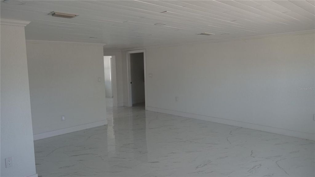 Photo of 177 Dowling Avenue NE, Port Charlotte, FL 33952 (MLS # O6385323)