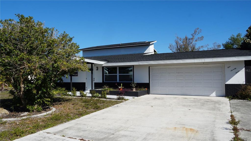 Photo of 177 Dowling Avenue NE, Port Charlotte, FL 33952 (MLS # O6385323)