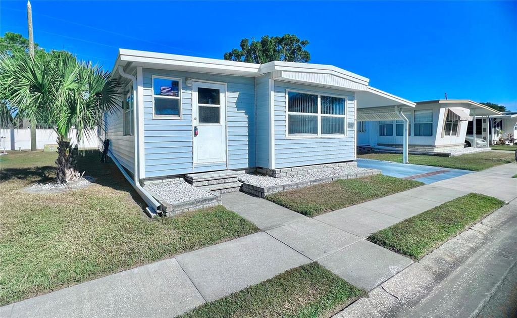 Photo of 1100 Belcher Road S #23, Largo, FL 33771 (MLS # TB8452219)