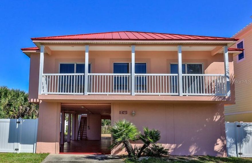 Welcome to the Red Roof Beach Cottage! Enjoy unobstructed ocean views from this beautiful beach side home! Walking distance to the ocean and the National Seashore Park or go to JB's Fish Camp for kayaking and boat launch. Beautiful sunrises and sunsets. Includes all the amenities to make you feel like your home. Complimentary wifi, washer and dryer, and cable TV. The home has 3 bedrooms and 2 baths with two balconies, an ocean view kitchen with breakfast bar and living area.  2 bedrooms have  King sized beds with TV and entrance to the  the ocean view balcony. The 3rd bedroom has a twin bed with trundle. Extra sheets, blankets and towels will be available for your use. Tenants will have access to the upstairs home. The backyard is a common area shared between the upstairs home and downstairs studio. NO PETS. ;CleaningFee: 200