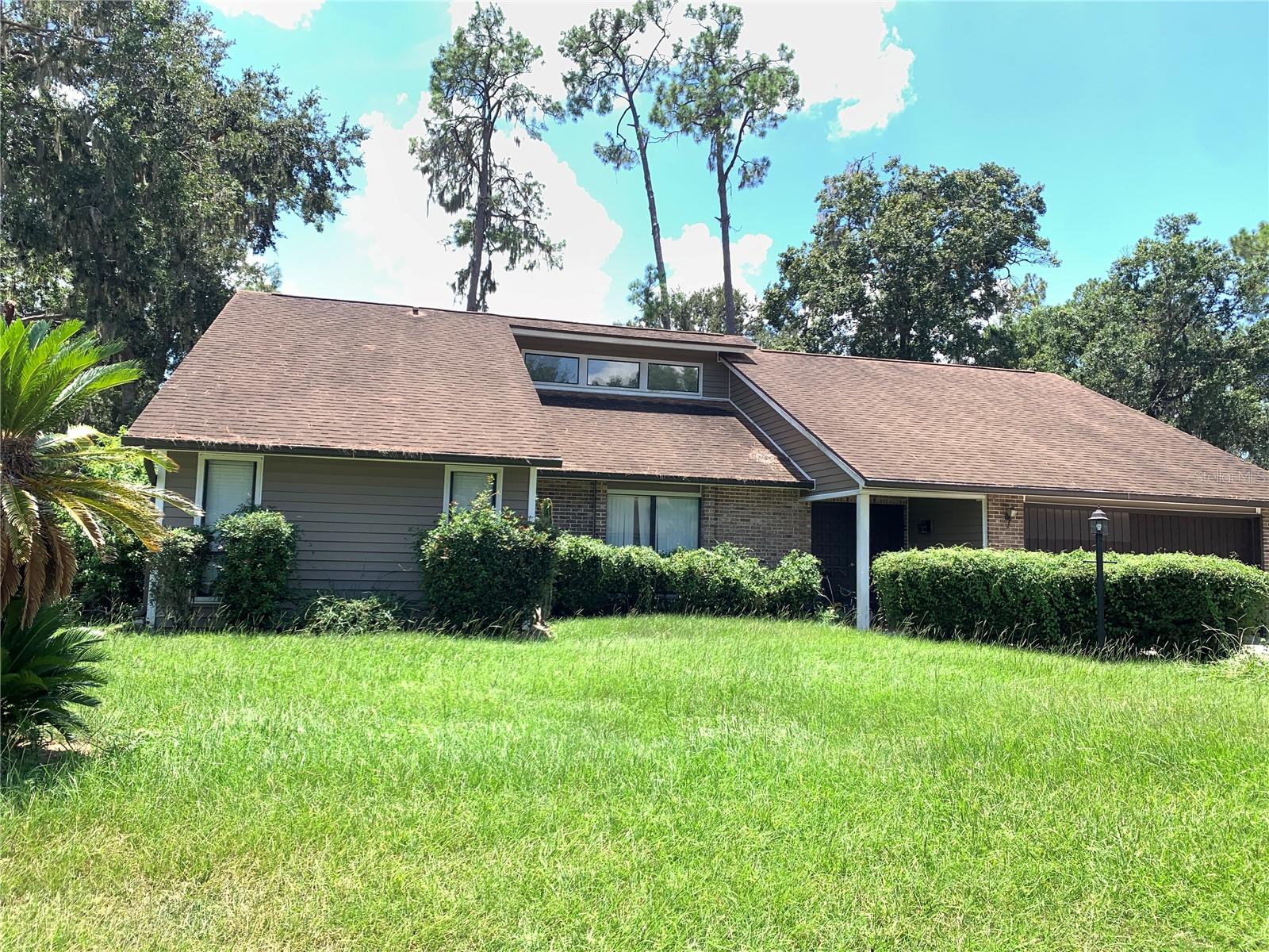 Located on a spacious 0.28 acre lot in a quiet Bloomingdale neighborhood, this 4-bedroom, 2-bath home is packed with potential. Plus the big-ticket upgrades are already done for you! Enjoy peace of mind with a newer roof, Ridgetop exterior vinyl siding, new water heater, newer HVAC, and updated CPVC plumbing. Inside, the split floor plan offers plenty of flexibility with vaulted ceilings, an upgraded kitchen, and a master suite featuring a walk-in closet, walk-in glass shower, plus a separate jacuzzi tub with a garden bay window to let in even more natural light and sunshine. There's room to spread out, whether you're entertaining in the open living areas or relaxing in the cozy fireplace room. Step outside to your covered patio, screened pool deck, and recently fenced backyard—perfect for weekend BBQs or evening swims. Pool pump and filter are in good working order. Additional features include a spacious garage, a separate laundry room with built-in shelving, attic storage space, a wood burning fireplace, and loads of potential to make this home your own.