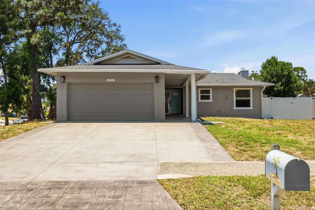 Photo of 4712 Simcoe Street, Palm Harbor, FL 34683 (MLS # TB8524117)