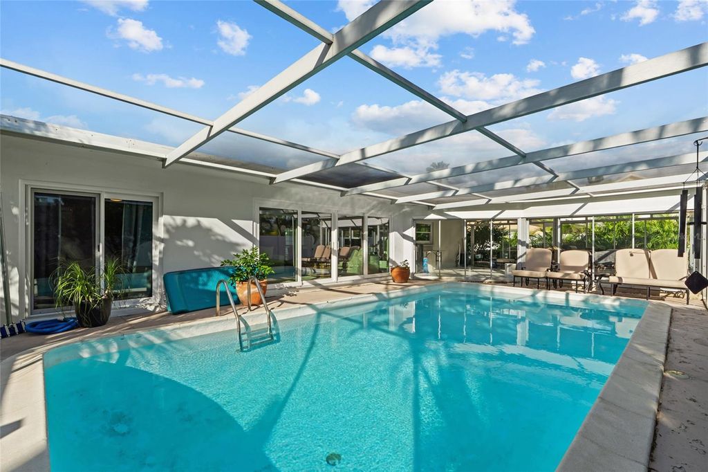 Photo of 114 14th Street, Belleair Beach, FL 33786 (MLS # TB8435873)