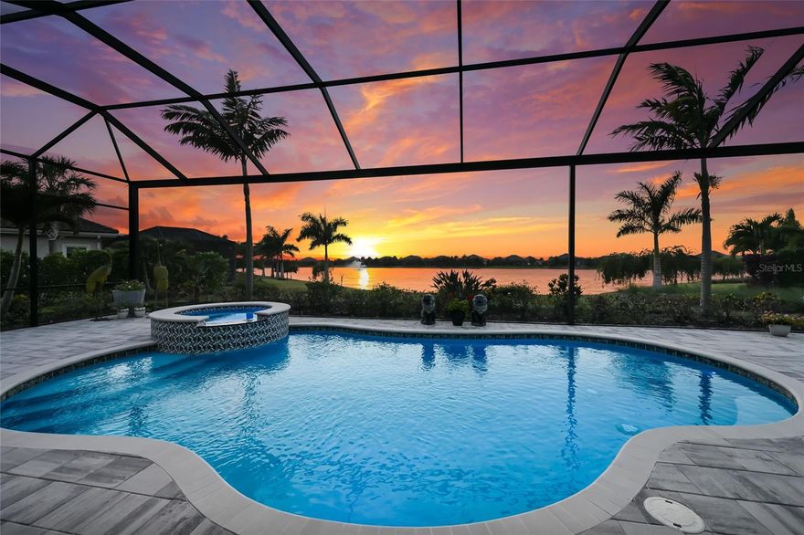 Private estate with a separate guest house positioned on one acre inside the exclusive gated community of The Lake Club with breathtaking lakefront westerly sunset views offers an unparalleled opportunity for flexible luxury living.

This exceptional property offers a highly sought-after layout in Lakewood Ranch featuring a 3 bedroom, 3 full bath main residence complemented by a fully independent 2 bedroom, 2 full bath private casita, ideal for extended family, guests, or a dedicated work-from-home retreat.  Added in 2024, the newly built separate entry living quarters also boasts a living area, a den and its own kitchenette complete with microwave, refrigerator drawers and dishwasher. 

Meanwhile, the main house is a stylishly open one-story great room plan plus a study that epitomizes the indoor-outdoor living experience with thoughtfully planned living spaces, accentuated volume ceilings, skillfully selected finishes, and, of course, all IMPACT windows/doors/sliders. 

The expansive outdoor retreat elevates with a panoramic screened lanai, extensive open and under cover spaces, soaring ceilings, full summer kitchen, PebbleTec heated saltwater pool/spa with sun shelf, and an inviting gas fireplace. Ten foot impact disappearing glass sliders seamlessly connect the outdoor oasis to a luxuriantly welcoming great room, dining area and gourmet kitchen crowned with coffered ceiling, accent wall, and designer light fixtures creating a sophisticated open continuity of space. Off the dining room, the gourmet kitchen further accentuates with wood cabinetry, soft-close dove-tail drawers, newly installed quartz counters and backsplash, stainless steel appliances, wine fridge, and walk-in pantry. The residence also offers an impressive office behind double-entry doors just off the entry foyer.

The owner’s quarters positioned on a private wing in the main residence offers  double tray ceilings, large scale windows, direct lanai access, two oversized walk-in customized closets, and a spa-like bath with dual station vanity, an oversized shower with designer tile, a large soaking tub, and separate water closet. There are  two additional guest suites in the main house, each on a separate wings of the home generous in size with luxury plank vinyl flooring, one offering an ensuite full bath, while the third guest room is just off the home’s pool bath bath.


Other notable highlights of this stunning residence includes a brilliantly finished laundry room with cabinetry and sink, tankless water heater, all impact windows and doors, smarthome automation, and an oversized three car air-conditioned garage with epoxy flooring and storage. This rare offering beckons a lifestyle fulfilled in The Lake Club, where residents enjoy access to a wealth of amenities, including two resort-style heated pools, Grande Clubhouse with fine dining and bar area, a fitness center, spa, tennis courts, pickleball, a playground, dog park, and services of a full-time concierge and activities director.