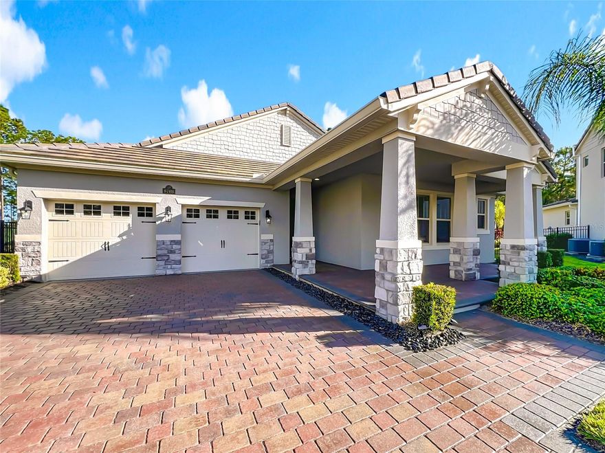 Nestled in Phase 3 of Waterleigh in Horizon West, this stunning single-story home offers 4 bedrooms and 3.5 bathrooms on a premium .41-acre lot with no rear neighbors, providing both privacy and tranquility. Situated on a quiet cul-de-sac, the home features beautiful views and a peaceful setting, just a short stroll from a charming community green space with a pavilion and picnic area. Inside, you’ll find wood-look tile flooring throughout the main living areas, and bedrooms with new engineered wood flooring recently added. The spacious master suite boasts a large walk-in closet, dual vanities, a soaking tub, and a glass-enclosed shower. A second bedroom at the front of the home offers its own private bathroom and walk-in closet, ideal for guests or multigenerational living. The chef’s kitchen features sleek quartz countertops, stainless steel appliances, and a functional layout perfect for entertaining. The laundry room has been upgraded with a new washer, dryer, refrigerator, sink, and added shelving for extra storage. Additional highlights include a 3-car garage with new epoxy flooring and Tesla EV charger outlet, recently sealed driveway and lanai, and newly installed rain gutters. Enjoy low-maintenance living with lawn and shrub care included in the HOA. Waterleigh offers a wide range of resort-style amenities, including three pools, fitness centers, community clubhouses, mini golf, dog parks, and scenic walking trails. Conveniently located near Publix and just a short drive to many restaurants and Disney World. This home combines luxury, comfort, and convenience.