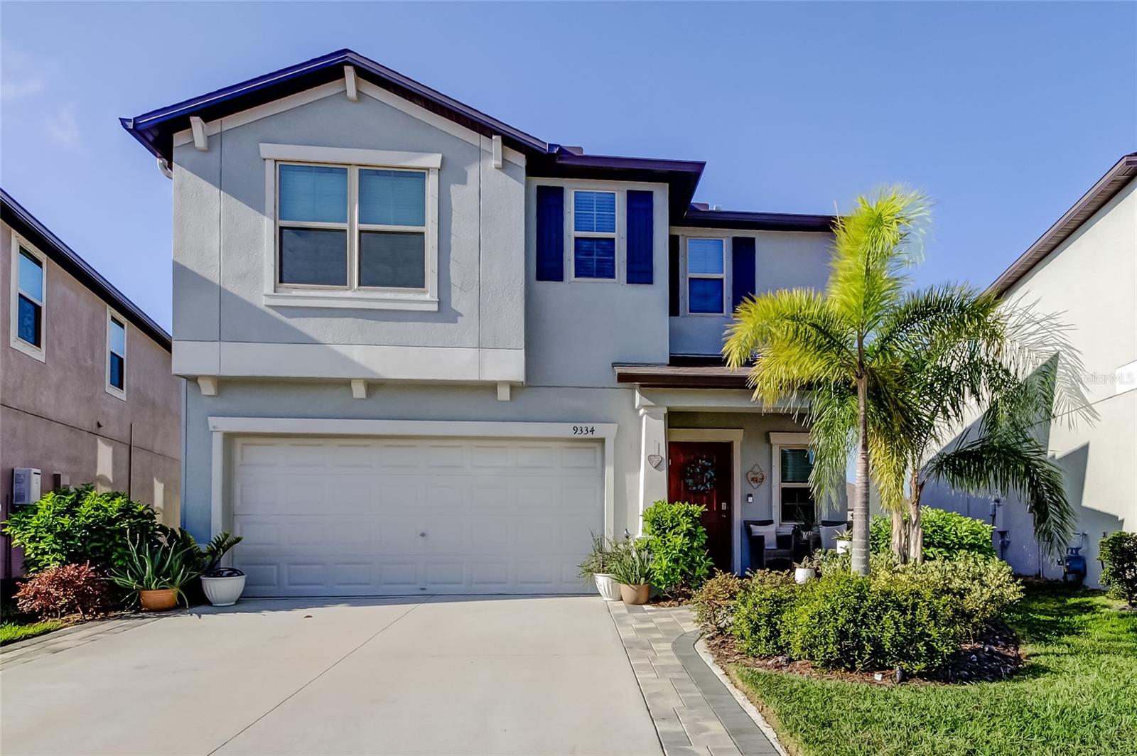 Enjoy the Best of Greater Tampa Bay Living in this multi-generational community with resort-style amenities in Belmont West! This home is a contemporary, two-story, two-car garage, Concord model home that was built in 2022, METICULOUSLY MAINTAINED, and has the BACKYARD OASIS of your dreams! This immaculate 6 bedroom, 3 bath residence is the picture of serenity, with lush landscaping, gorgeous front curb appeal, and stone pavers along the exterior. Enter your keyless door entry and step inside to your wideset foyer which leads to a premier kitchen and dining space, spacious family room, guest bedroom and well-appointed full bath on the main level! The second floor features a versatile LOFT space along with the primary suite with walk-in closet, second floor laundry room, and four additional bedrooms and bathroom. The LOFT is great for a gym/pilates studio, game room, pool table, music room, library, lounge (as pictured), craft room, home office, and more! If you can dream it, this LOFT will accommodate it. With over 2600 square feet of living space, there's someplace for everyone! You can find comfort in the like-new features of the home including ceramic tile flooring, GRANITE countertops, modern cabinetry with stainless steel appliances, ceiling fans and updated lighting, all of which are still in pristine condition. And there is more! Step outside and serenity abounds! Your backyard oasis is complete with a fully fenced in backyard complete with a shaded pergola, living and dining space with tv mounts, rustic wood ceiling fans, outdoor lighting, textured stone pavers throughout the courtyard. The outdoor kitchen features an island with GRANITE countertops and a built in mini-fridge and space to add a grill. Your new home in the Belmont West community features many resort-style amenities including serene walking trails perfect for jogging, walking, and bike riding alongside miles of pond views. Additionally, the amenities feature a clubhouse with gated access to two oversized swimming pools, a tennis court, a basketball court, a dog park, a picnic area, a fire pit, and playgrounds. Coming in 2026, the Belmont community will feature a third pool, community fitness center, and clubhouse! The Belmont community hosts many community events seasonally and spotlights local food truck vendors on a weekly basis. Enjoy convenient access to Restaurants, Shopping, Golf, Family Entertainment, phenomenal Medical and Dental Centers, and schools within two to five miles of the home. The home is a commuter's delight as all highways are located in a short distance including I-75, U.S. Hwy.41, Sun City Center, Ruskin, Riverview, and Tampa. The city of Ruskin is near many award-winning beaches and great fishing! Call for a showing today!