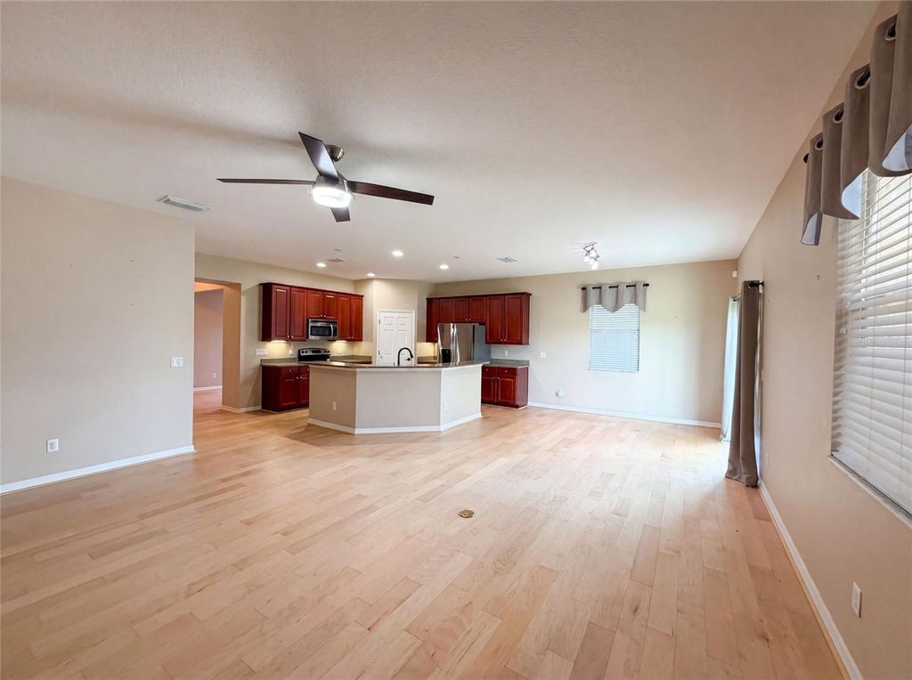 Photo of 5605 Windsong Oak Drive, Leesburg, FL 34748 (MLS # O6418852)