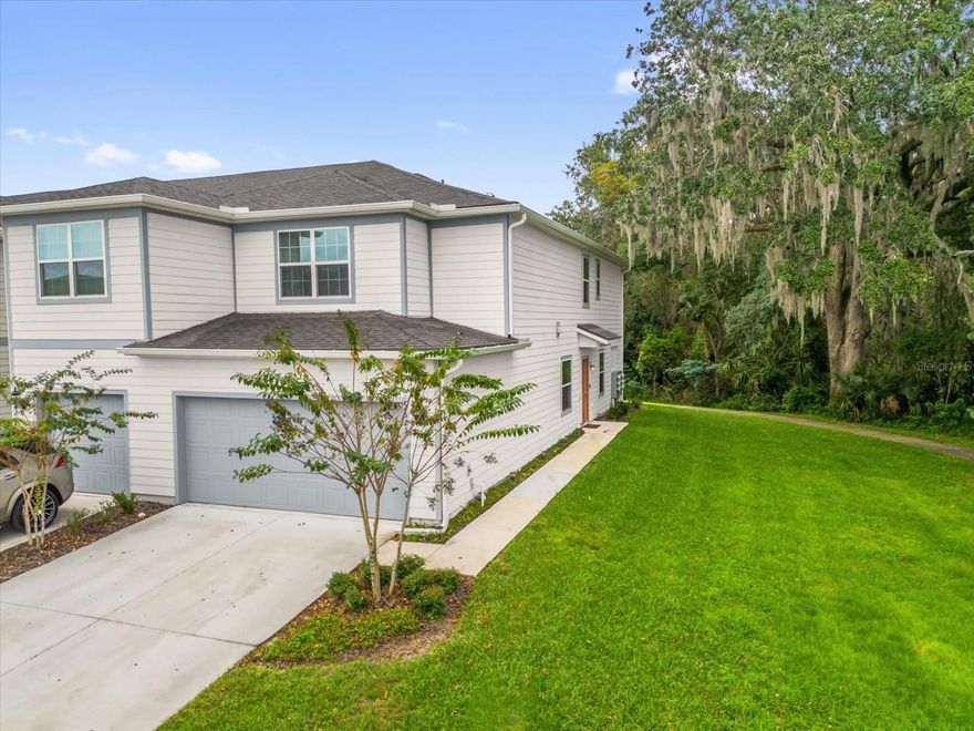 Built in 2023, this beautifully maintained 3-bedroom, 2 and a half-bathroom townhome offers modern style and comfort in a convenient location. This end unit features plenty of natural light, upgraded light fixtures, designer plumbing fixtures, and a custom accent wall feature. The open-concept living area creates a welcoming flow, complemented by a modern kitchen with stainless steel appliances. The kitchen is equipped with stainless steel appliances, a large island, and plenty of storage, perfect for everyday living and entertaining. The spacious primary suite includes a walk-in closet and a private en-suite bath equipped with dual vanities, and wash closet. Additional bedrooms are generously sized and versatile for guests, a home office, or additional living space. An attached two-car garage provides secure parking and additional storage. Other highlights include a second floor laundry closet, and a private patio ideal for relaxing outdoors. Conveniently located near Disney, major retail shopping, dining, and major highways, such as 192, 417, and Osceola Parkway, this home offers both style and convenience. Contact today for your private showing.