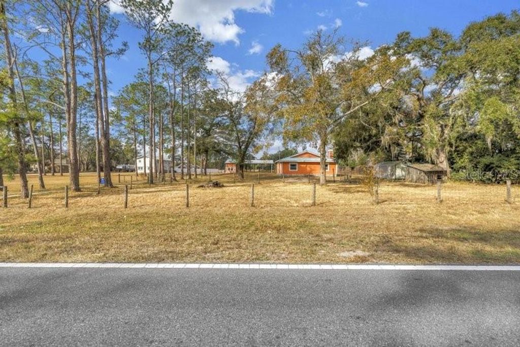 Photo of 8521 Ehren Cutoff, Land O Lakes, FL 34639 (MLS # TB8474108)