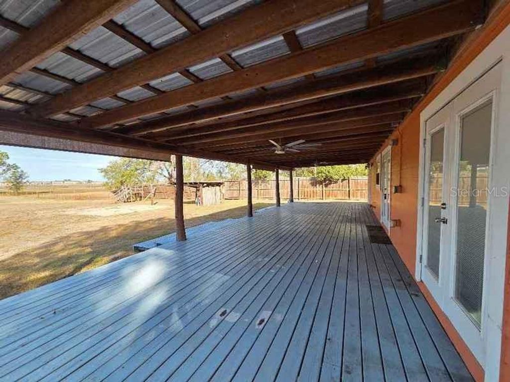 Photo of 8521 Ehren Cutoff, Land O Lakes, FL 34639 (MLS # TB8474108)