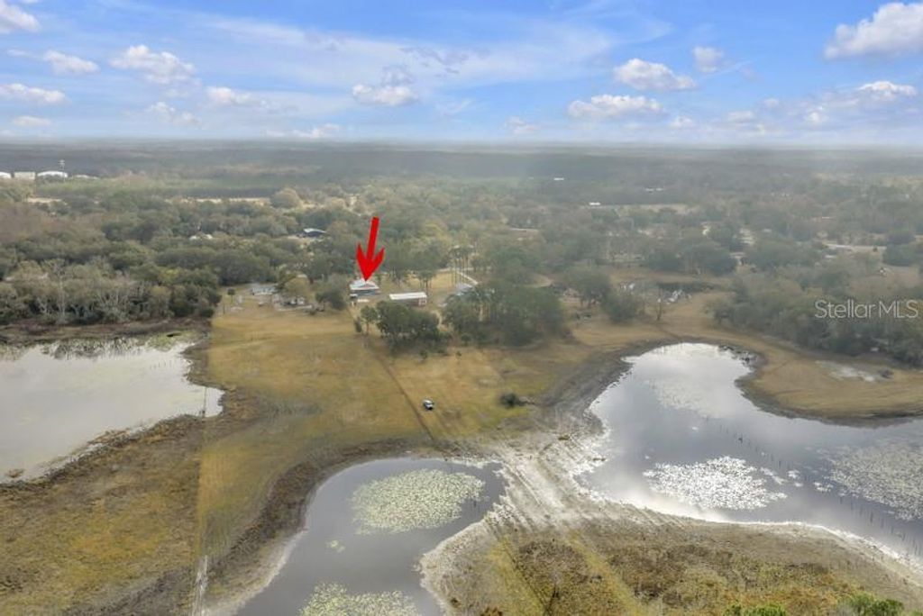Photo of 8521 Ehren Cutoff, Land O Lakes, FL 34639 (MLS # TB8474108)