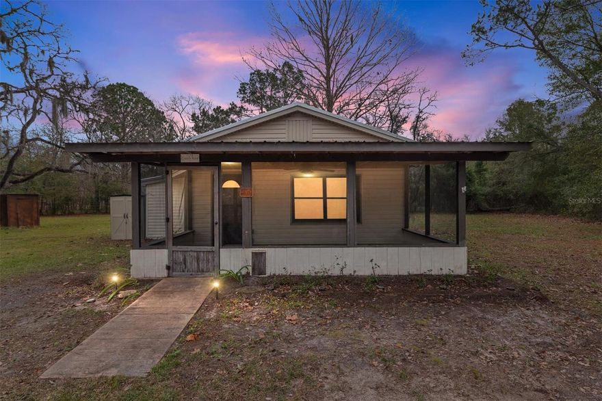 Investor special with plenty of potential. This 2 bedroom, 1 bathroom home sits on approximately 1.69 acres and offers a solid opportunity for an investor or buyer looking to add value through updates and personal touches. The home features a functional layout with a breakfast bar that opens the kitchen to the main living area, creating a practical space for everyday living or future improvements. With solid bones and room to reimagine, this property is well suited for a renovation project, rental investment, or long-term hold. The expansive lot provides ample space for outdoor living, expansion, or added features, all while offering privacy and a rural feel. Conveniently located close to Starke and a short distance to Gainesville, this property offers a balance of quiet living with access to shopping, dining, and major employers. Bring your vision and turn this property into a strong investment opportunity.