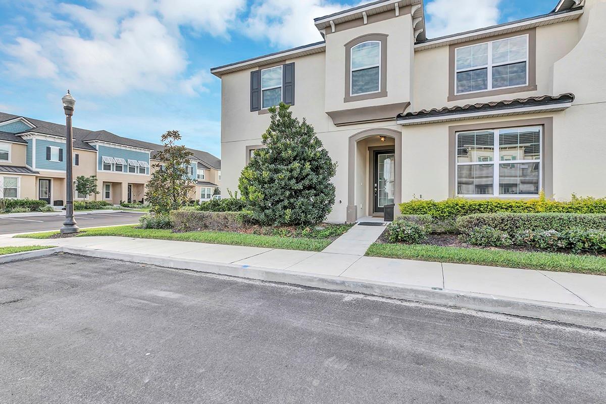 Short Sale. Fully Furnished 5BR/5BA Townhome in Gated Solara Resort. Spacious and Modern, this is a 5-bedroom, 4,5 bathroom open-concept living and dining area with a fully equipped kitchen and stainless steel appliances. Private screened-in patio for relaxing or entertaining, in-unit washer & dryer, smart TVs, high-speed Wi-Fi. Three bedrooms have king-size bed,s and the other 2 have 2 twins. The Solara Resort offers several amenities: heated resort-style pool, splash pad & private cabanas, Surf simulator (FlowRider), gym & fitness lawn, Basketball, soccer & sand volleyball courts, On-site restaurant, coffee bar, and sundries shop, Game room, teen lounge, and playground, 24/7 manned security gate for peace of mind. Perfect for living or investing as a vacation airbnb rental. Both allowed for phase 1 construction. Lastly, this unit is few minutes from the clubhouse.
