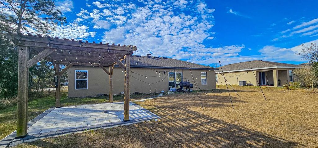 Photo of 271 Begonia Lane, Poinciana, FL 34759 (MLS # O6381700)