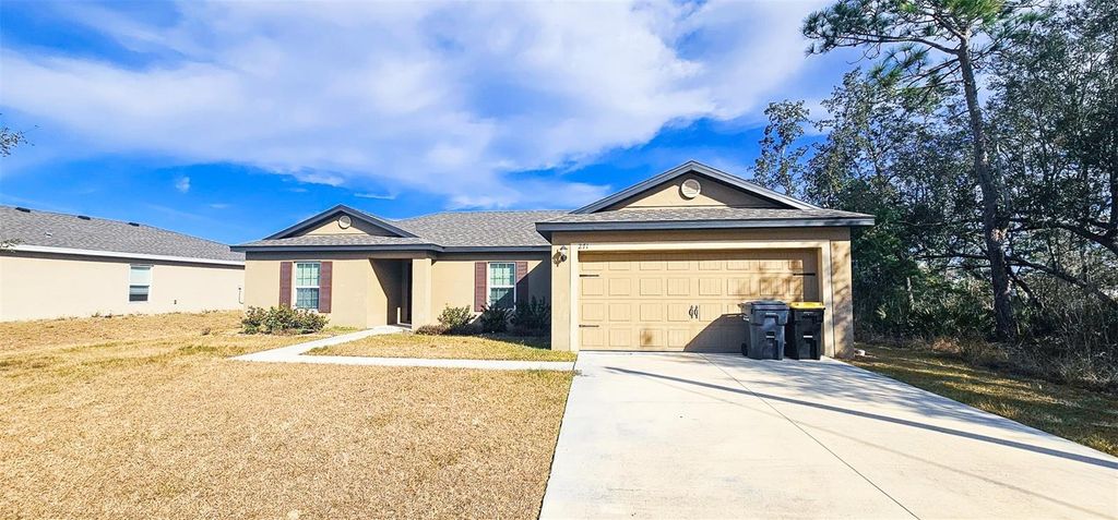 Photo of 271 Begonia Lane, Poinciana, FL 34759 (MLS # O6381700)